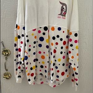 Used Disney polka dot spirit jersey. Medium.